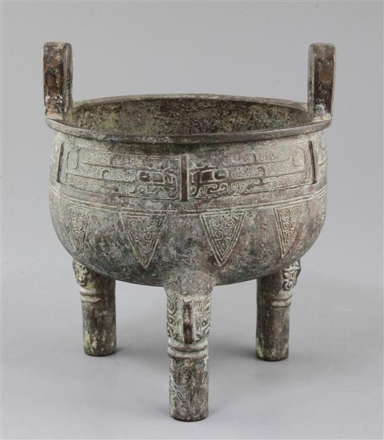 A Chinese archaistic bronze tripod ritual food vessel, Ding, early Western Zhou dynasty style, 19cm high, 16cm wide